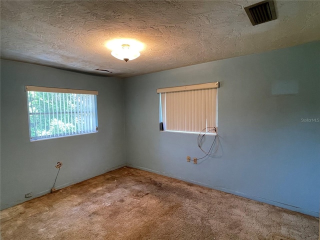 104 S Jeffery St, Beverly Hills, FL 34465 - carpeted spare room with a textured ceiling
