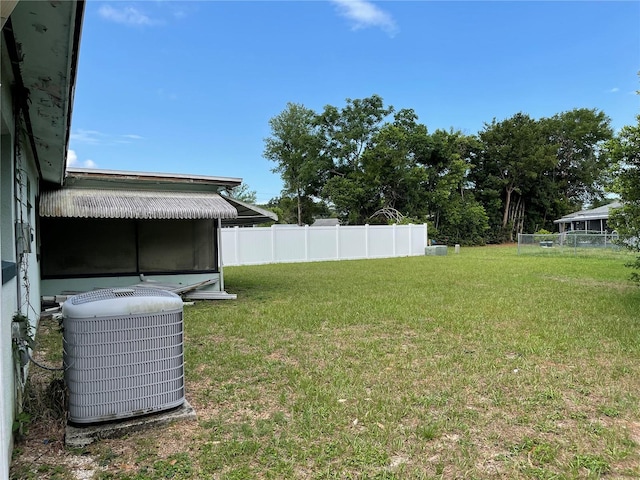 104 S Jeffery St, Beverly Hills, FL 34465 - view of yard featuring central AC