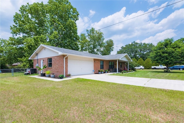 126 SW Mockingbird Way, Lake City, FL 32024 - ranch-style home featuring brick siding, an attached garage, and concrete driveway