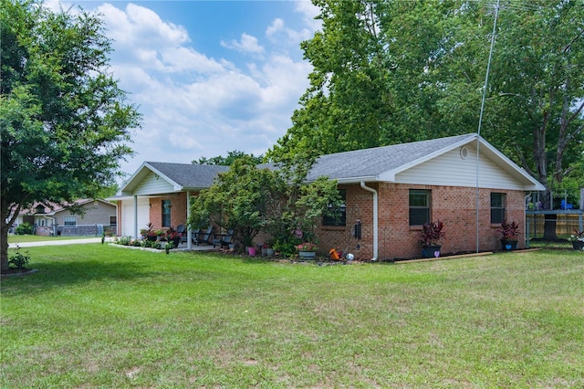126 SW Mockingbird Way, Lake City, FL 32024 - ranch-style house with brick siding and an attached garage
