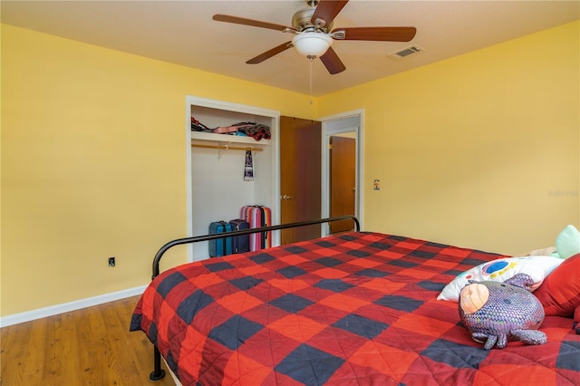 126 SW Mockingbird Way, Lake City, FL 32024 - bedroom with wood finished floors, baseboards, and ceiling fan