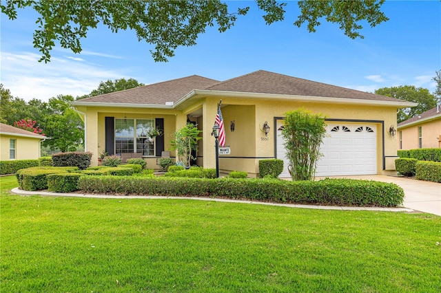 9551 SW 92nd Ter, Ocala, FL 34481 - ranch-style house with a front lawn, concrete driveway, stucco siding, and a garage