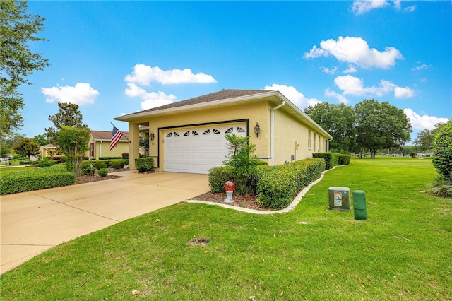 9551 SW 92nd Ter, Ocala, FL 34481 - view of side of home with concrete driveway, an attached garage, a yard, and stucco siding