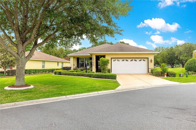 9551 SW 92nd Ter, Ocala, FL 34481 - ranch-style home featuring an attached garage, a front yard, concrete driveway, and stucco siding