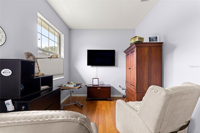 9551 SW 92nd Ter, Ocala, FL 34481 - living room with wood finished floors and baseboards