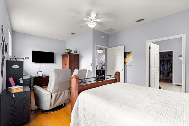 9551 SW 92nd Ter, Ocala, FL 34481 - bedroom featuring light wood-style flooring, ceiling fan, and lofted ceiling