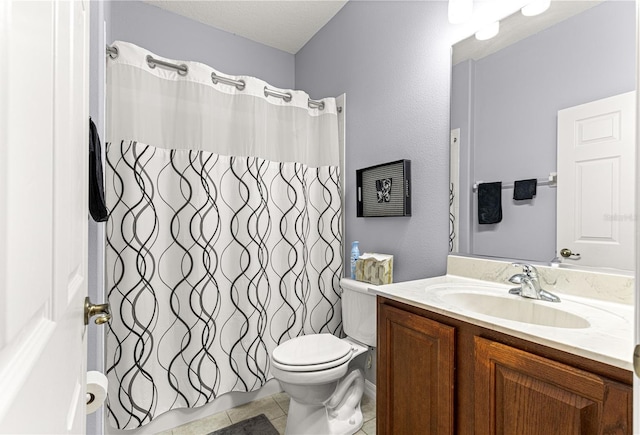9551 SW 92nd Ter, Ocala, FL 34481 - bathroom with toilet, vanity, and tile patterned flooring