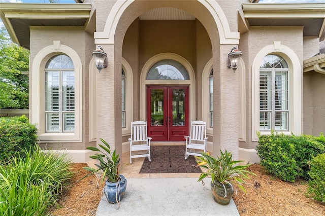 3986 SE 43rd Cir, Ocala, FL 34480 - entrance to property featuring stucco siding and french doors