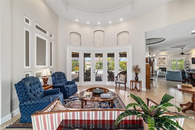 3986 SE 43rd Cir, Ocala, FL 34480 - living room featuring recessed lighting, a towering ceiling, ceiling fan, tile patterned flooring, and french doors