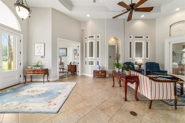 3986 SE 43rd Cir, Ocala, FL 34480 - entrance foyer with a high ceiling, ceiling fan, recessed lighting, arched walkways, and light tile patterned floors