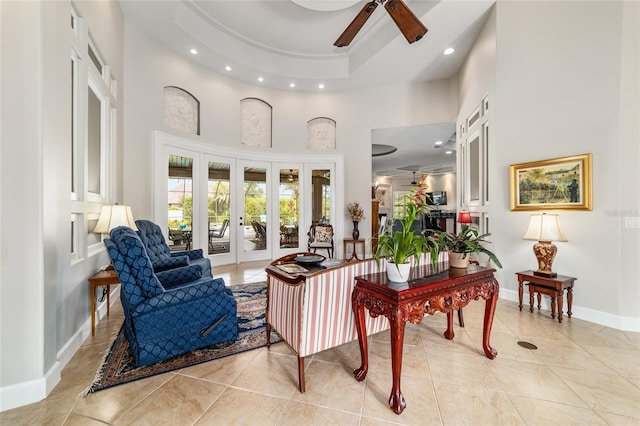 3986 SE 43rd Cir, Ocala, FL 34480 - living room with ceiling fan, a high ceiling, recessed lighting, french doors, and light tile patterned flooring