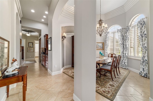 3986 SE 43rd Cir, Ocala, FL 34480 - foyer with recessed lighting, ornamental molding, a high ceiling, light tile patterned floors, and a chandelier