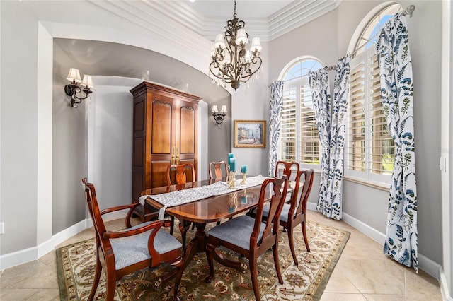 3986 SE 43rd Cir, Ocala, FL 34480 - dining space featuring plenty of natural light, a chandelier, crown molding, and light tile patterned floors