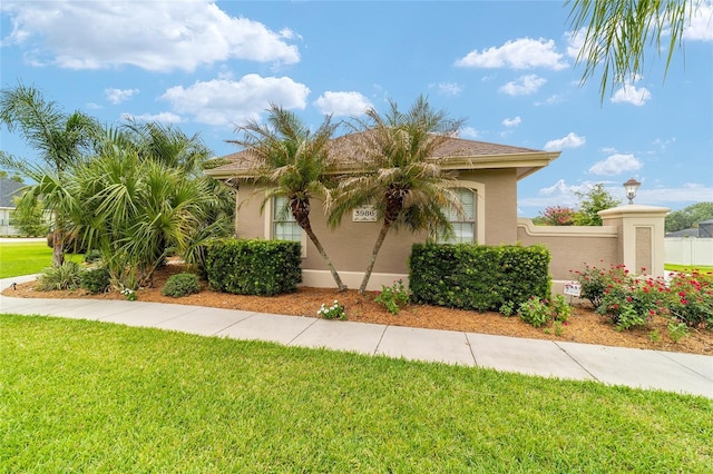 3986 SE 43rd Cir, Ocala, FL 34480 - view of front of house with stucco siding