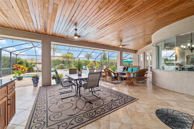 3986 SE 43rd Cir, Ocala, FL 34480 - sunroom / solarium featuring outdoor dining area, ceiling fan, and a chandelier