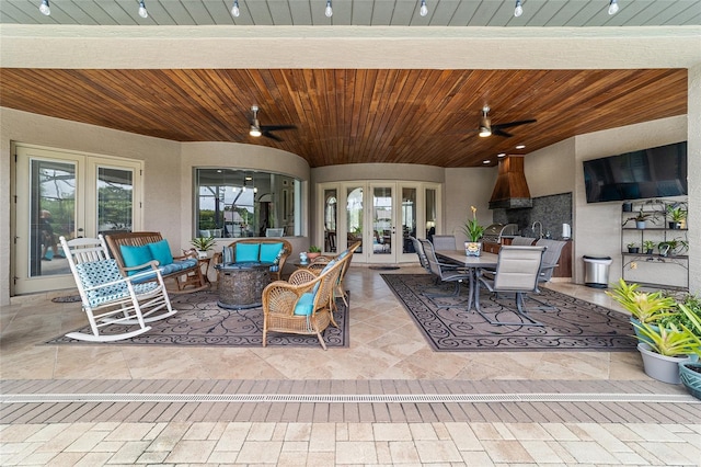 3986 SE 43rd Cir, Ocala, FL 34480 - view of patio / terrace featuring french doors, a ceiling fan, an outdoor hangout area, and outdoor dining area
