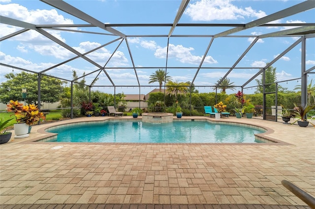3986 SE 43rd Cir, Ocala, FL 34480 - view of pool with a patio area, a pool with connected hot tub, and a lanai