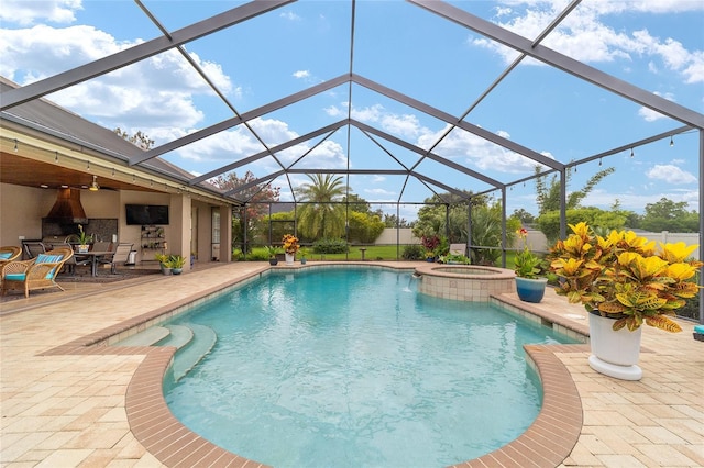 3986 SE 43rd Cir, Ocala, FL 34480 - view of swimming pool featuring a patio, a pool with connected hot tub, a lanai, and outdoor dining space