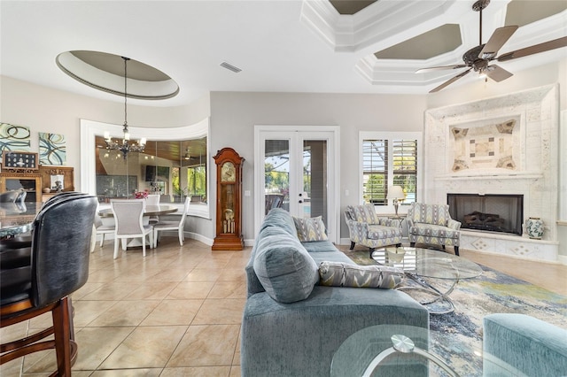 3986 SE 43rd Cir, Ocala, FL 34480 - living room featuring a chandelier, a fireplace, tile patterned flooring, coffered ceiling, and a ceiling fan