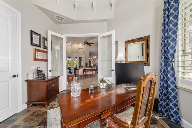 3986 SE 43rd Cir, Ocala, FL 34480 - office area featuring french doors, ceiling fan, and dark stone finish floors