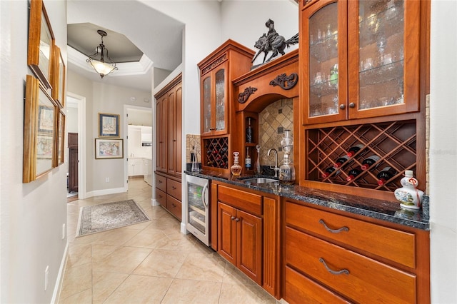 3986 SE 43rd Cir, Ocala, FL 34480 - indoor wet bar with wine cooler, decorative backsplash, and light tile patterned floors