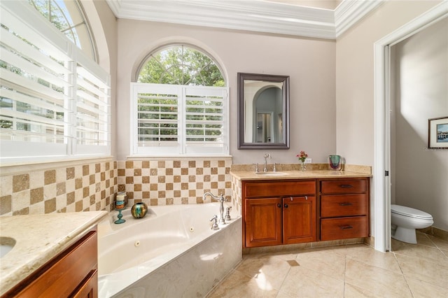 3986 SE 43rd Cir, Ocala, FL 34480 - full bathroom featuring vanity, a tub with jets, and ornamental molding