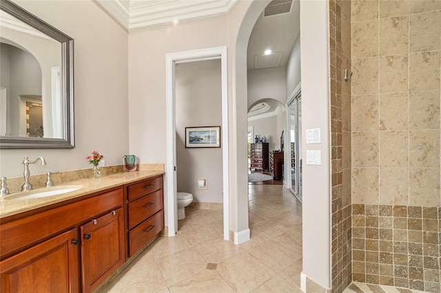 3986 SE 43rd Cir, Ocala, FL 34480 - full bathroom featuring vanity, tile patterned flooring, tiled shower, and crown molding