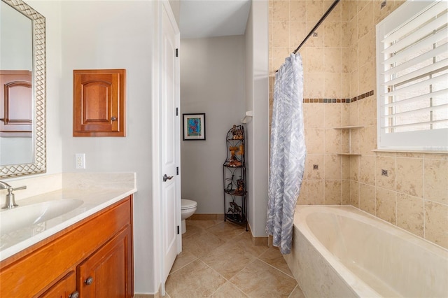 3986 SE 43rd Cir, Ocala, FL 34480 - bathroom featuring vanity, tiled shower / bath, and tile patterned floors