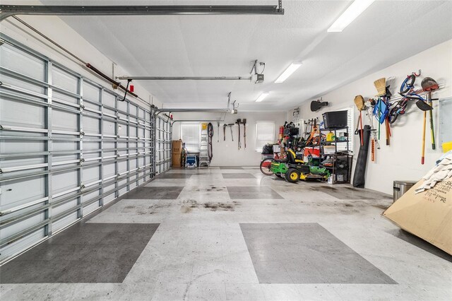 3986 SE 43rd Cir, Ocala, FL 34480 - garage with a garage door opener