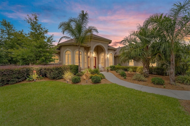 3986 SE 43rd Cir, Ocala, FL 34480 - mediterranean / spanish-style home featuring stucco siding and a yard