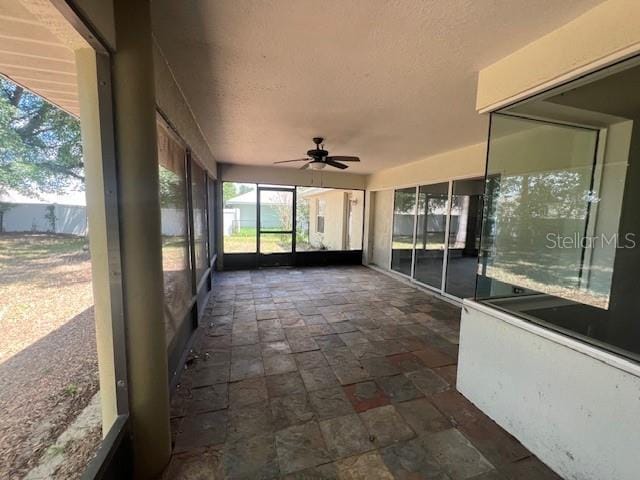 8100 SW 56th Ter, Ocala, FL 34476 - unfurnished sunroom featuring a ceiling fan