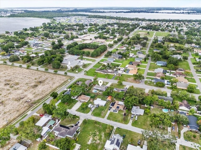 460 E Haines Blvd, Lake Alfred, FL 33850 - aerial view of property and surrounding area featuring a large body of water and nearby suburban area