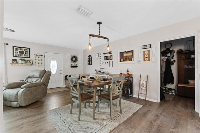 460 E Haines Blvd, Lake Alfred, FL 33850 - dining area with wood finished floors and baseboards