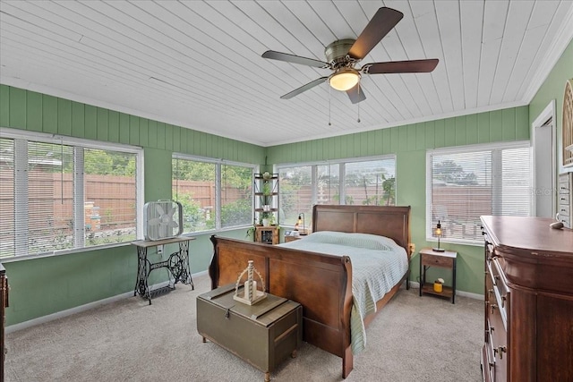 460 E Haines Blvd, Lake Alfred, FL 33850 - carpeted bedroom with wooden ceiling, multiple windows, baseboards, and ceiling fan