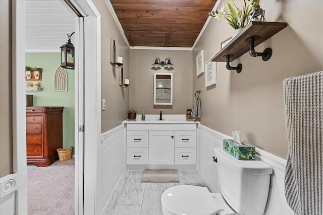 460 E Haines Blvd, Lake Alfred, FL 33850 - bathroom with toilet, vanity, ornamental molding, wainscoting, and wood ceiling