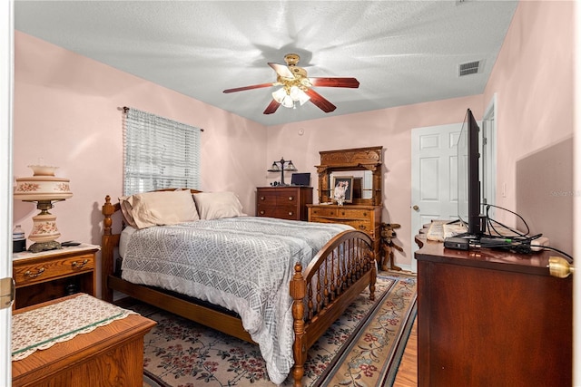 8732 SW 60th Cir, Ocala, FL 34476 - bedroom featuring light wood-style floors and a ceiling fan