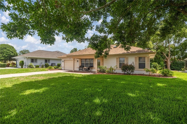 11326 SE 175th Pl, Summerfield, FL 34491 - ranch-style house featuring concrete driveway, a front yard, an attached garage, and stucco siding