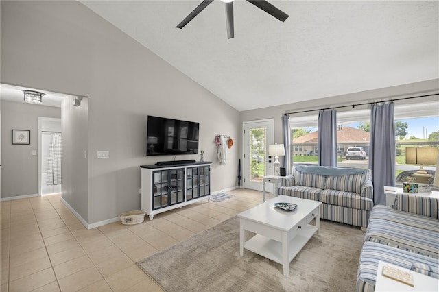 11326 SE 175th Pl, Summerfield, FL 34491 - living area with high vaulted ceiling, tile patterned floors, a ceiling fan, baseboards, and a textured ceiling