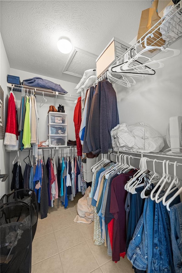 11326 SE 175th Pl, Summerfield, FL 34491 - spacious closet featuring tile patterned flooring and attic access
