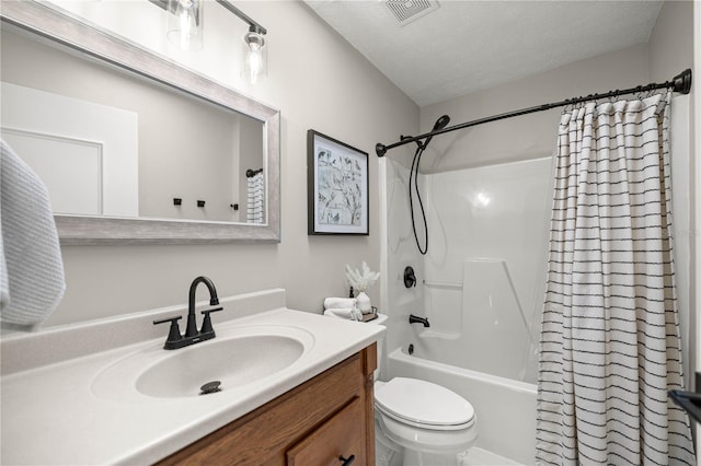 11326 SE 175th Pl, Summerfield, FL 34491 - full bathroom with shower / bathtub combination with curtain, vanity, toilet, and a textured ceiling