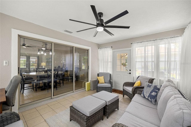 11326 SE 175th Pl, Summerfield, FL 34491 - living area with ceiling fan and light tile patterned floors