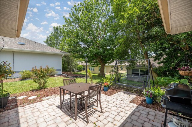 11326 SE 175th Pl, Summerfield, FL 34491 - view of patio featuring outdoor dining space and grilling area