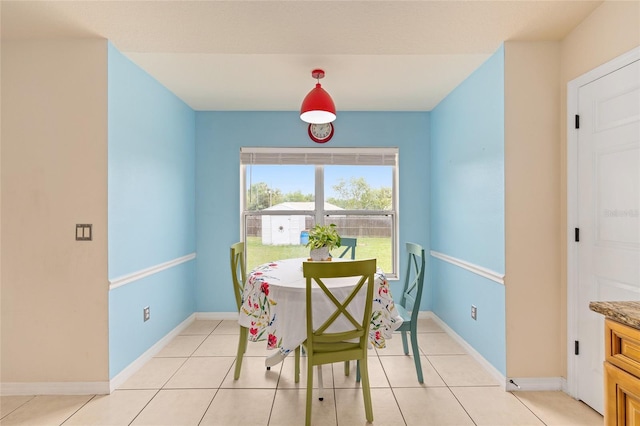 63 Walnut Crse, Ocala, FL 34480 - dining area featuring light tile patterned floors and baseboards