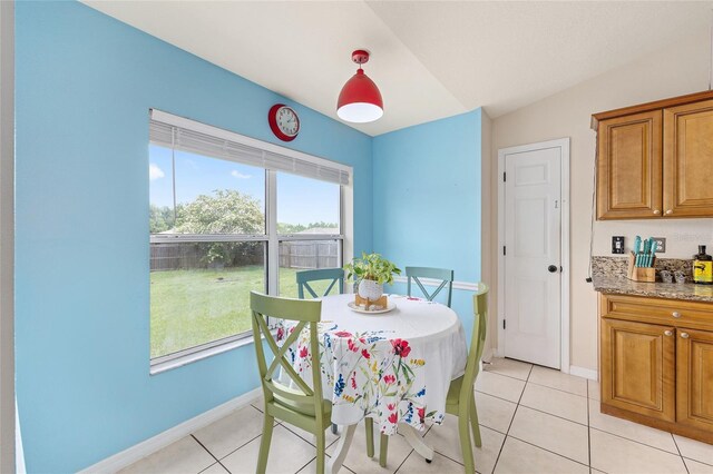 63 Walnut Crse, Ocala, FL 34480 - dining area with baseboards and light tile patterned floors