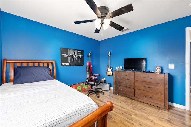 63 Walnut Crse, Ocala, FL 34480 - bedroom with wood finished floors, baseboards, and ceiling fan