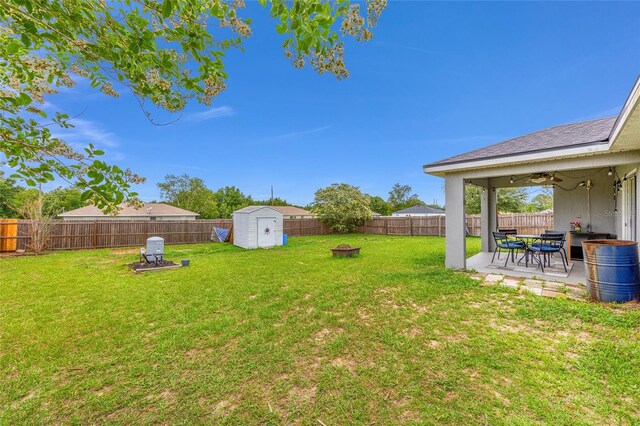 63 Walnut Crse, Ocala, FL 34480 - view of yard with a fire pit, a patio, and ceiling fan