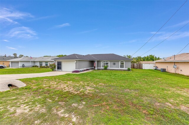 63 Walnut Crse, Ocala, FL 34480 - ranch-style house featuring driveway, an attached garage, and central air condition unit