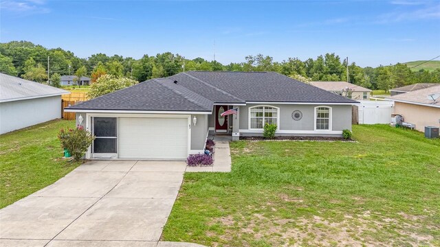 63 Walnut Crse, Ocala, FL 34480 - single story home with a garage, roof with shingles, driveway, and cooling unit