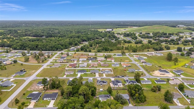63 Walnut Crse, Ocala, FL 34480 - aerial view of property and surrounding area featuring nearby suburban area