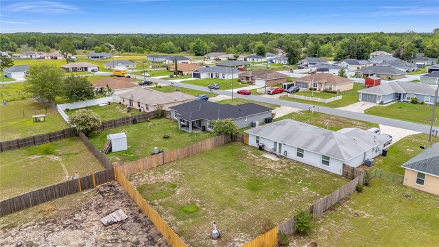 63 Walnut Crse, Ocala, FL 34480 - aerial perspective of suburban area featuring a heavily wooded area